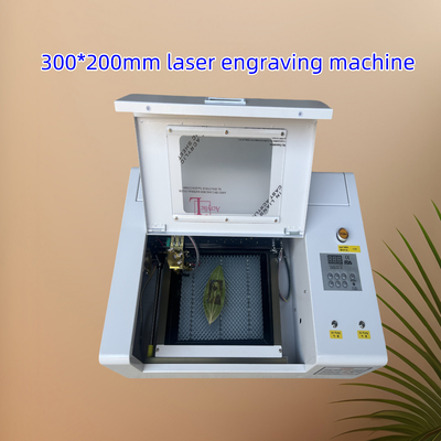 3020 300 * 200mm CNC CO2 لیزر حکاکی برای پارچه های چوبی آکریلیک
